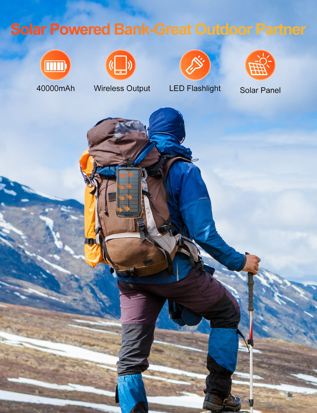 Person hiking with a solar-powered backpack in a mountainous landscape