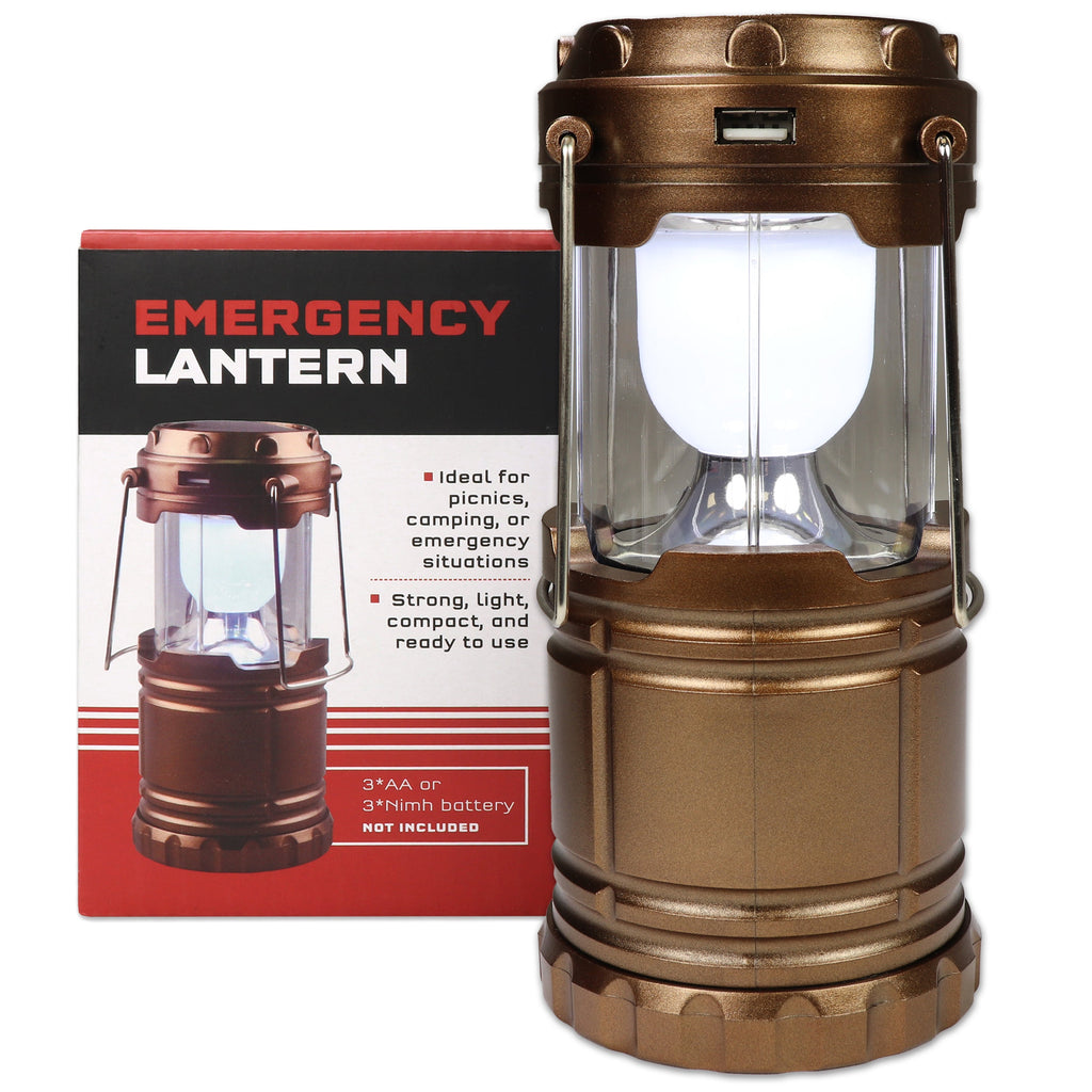 Emergency lantern in a metallic bronze/copper color with a clear glass shade and white LED light, shown next to its retail box on a white background.
