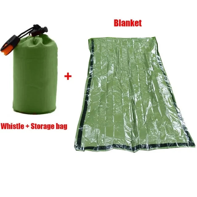 Green blanket with a whistle and storage bag on a white background