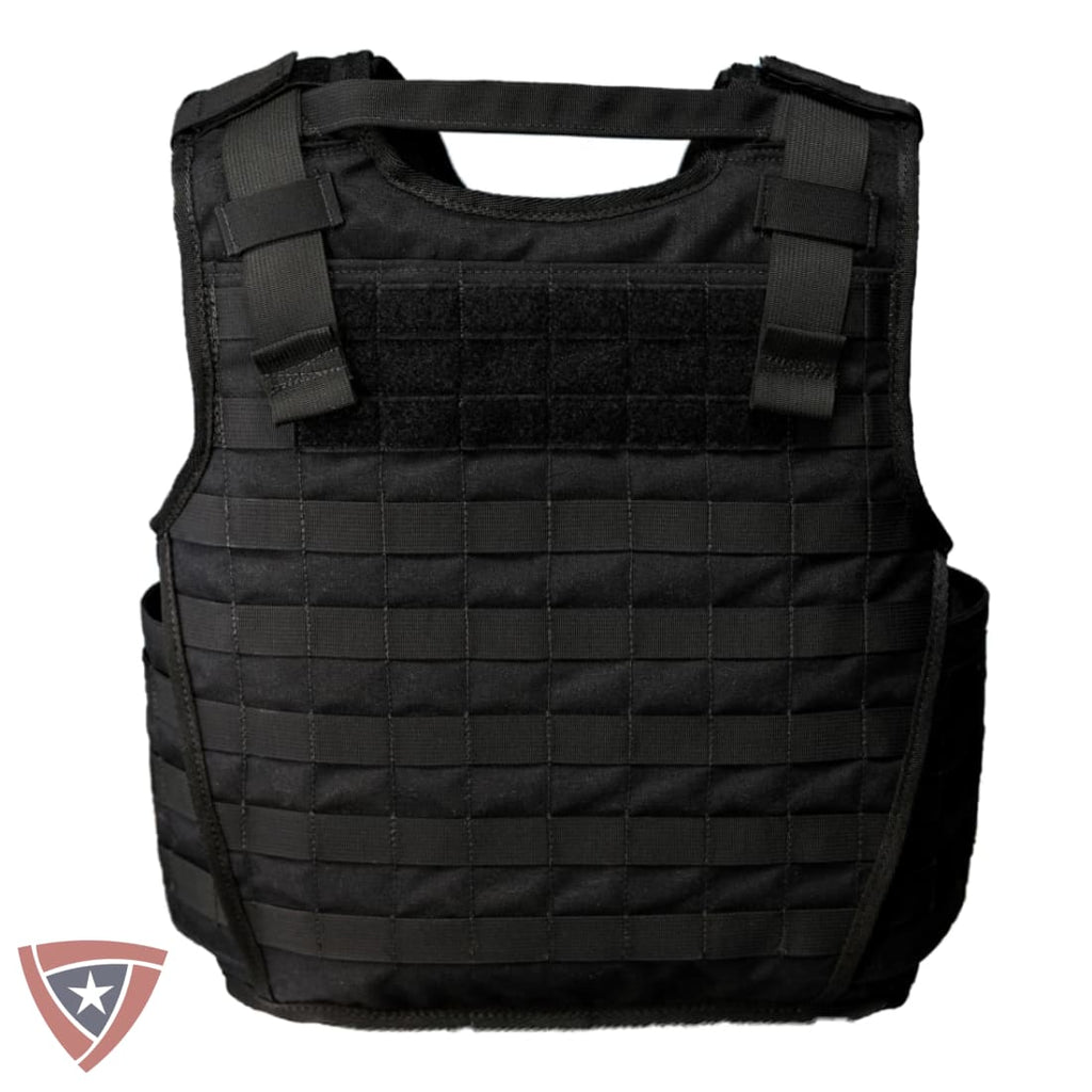A black tactical plate carrier vest with MOLLE webbing and hook-and-loop panels, shown against a plain white background with a small shield logo in the bottom-left corner.