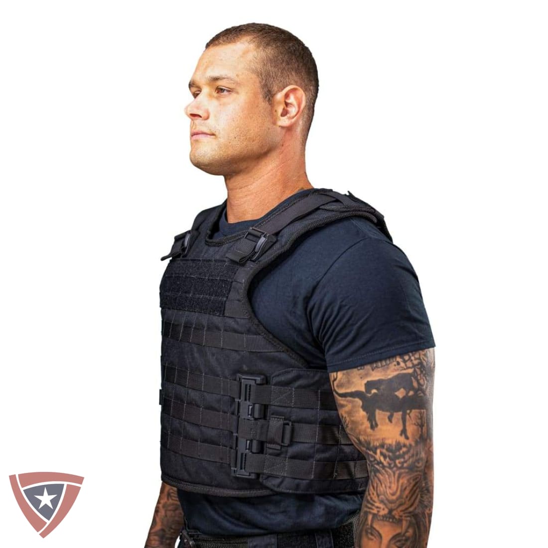Man wearing a black tactical vest on a white background