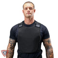 Man wearing a black protective vest on a white background