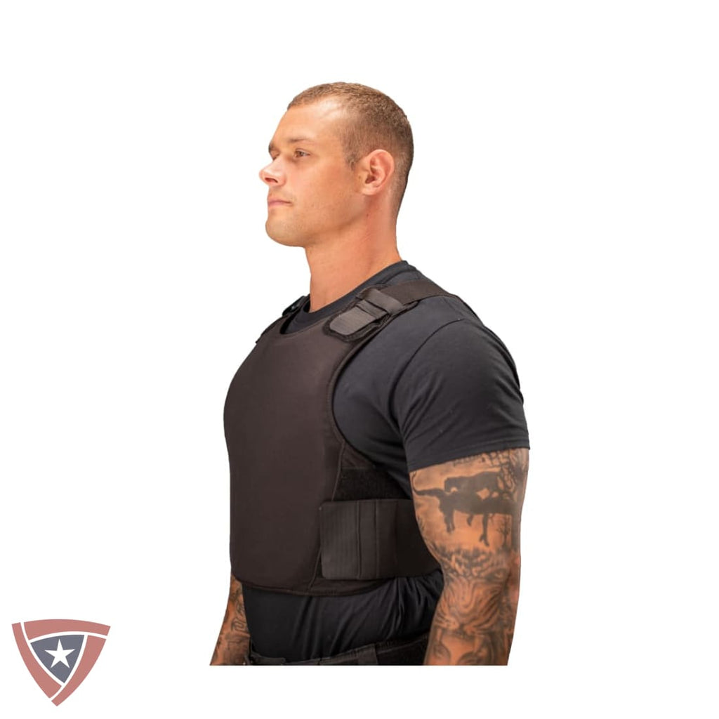 Man wearing a black tactical vest on a white background