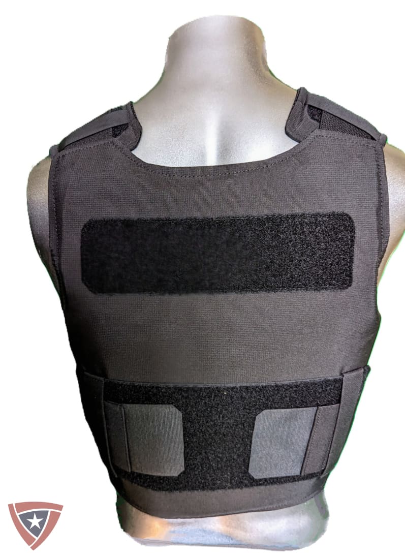 A dark gray tactical vest displayed on a metallic mannequin torso against a white background, featuring hook-and-loop closure panels.