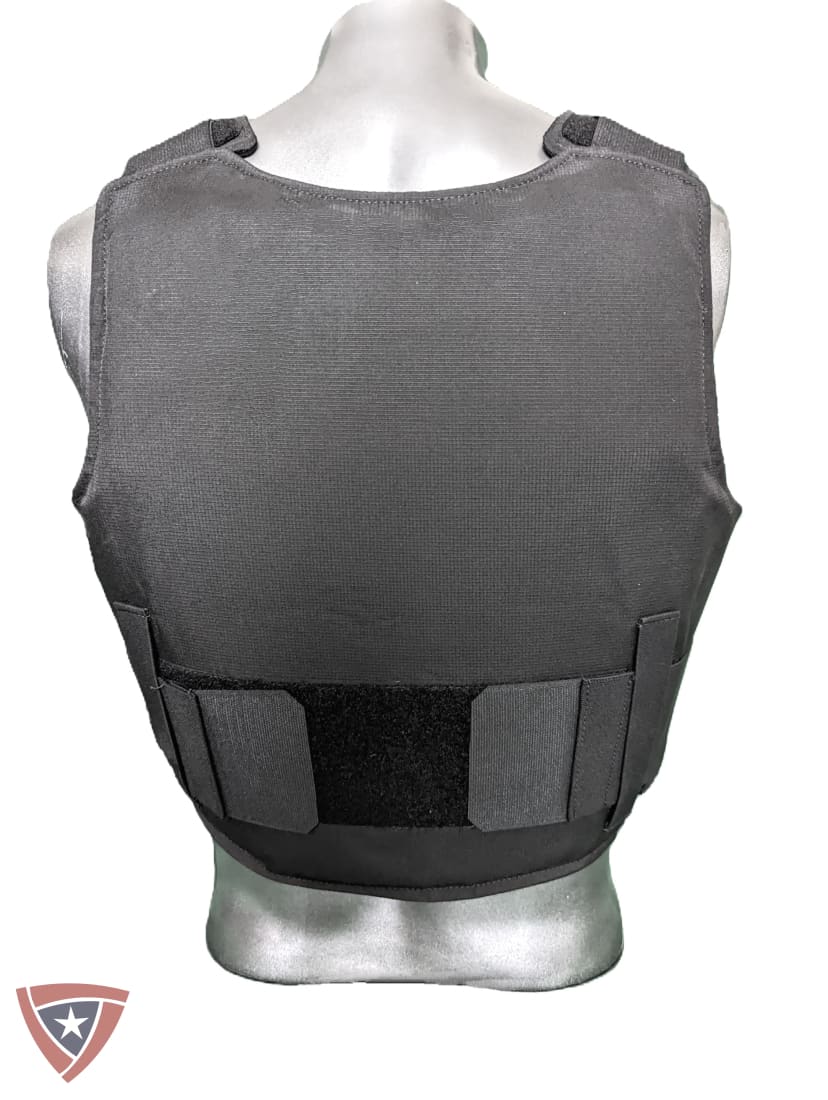 A dark gray tactical vest displayed on a silver mannequin torso, showing the back view with multiple attachment points and a black hook-and-loop strap section.