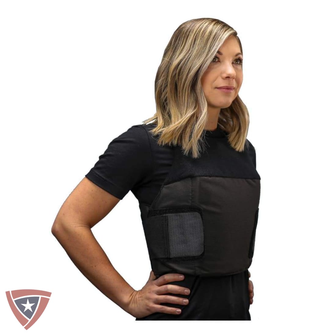 Person wearing a black tactical vest on a white background
